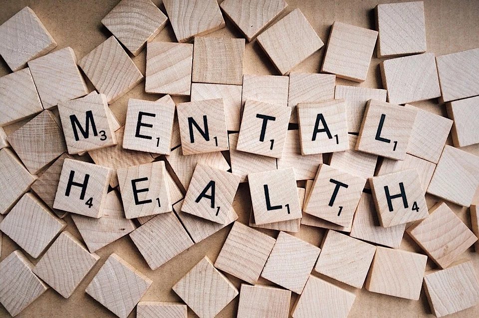 "Mental health" written in scrabble tiles